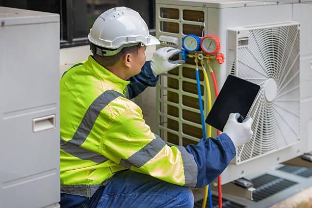 Professional Air Duct Cleaning technician working in Milford, NJ